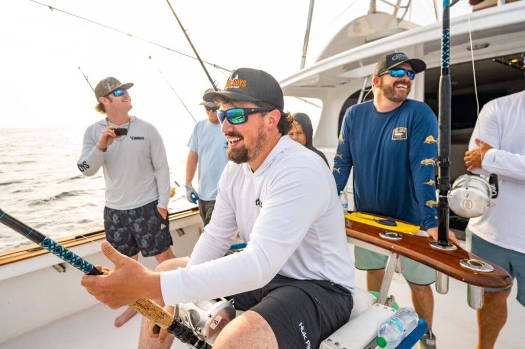 LandGuys client Mitch Gibbs in Outerbanks on his boat with LandGuys IL Broker and Iowa and Missouri Land Agent, Jesse Stay